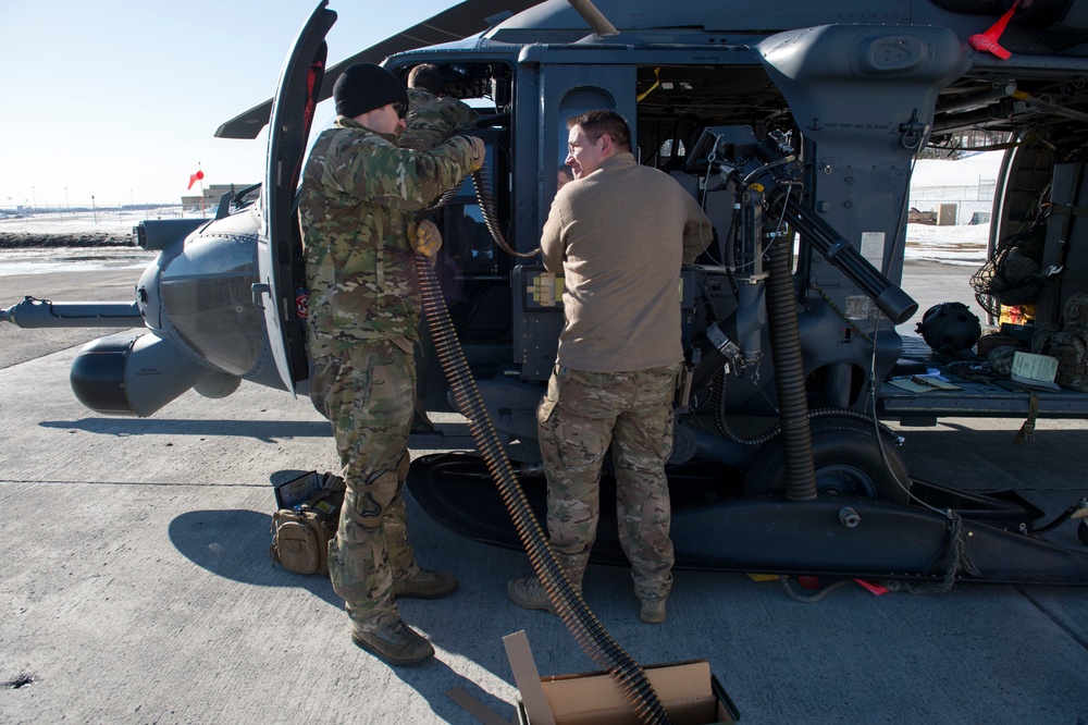 Alaska Air National Guardsmen prepare for aerial gunnery training at JBER