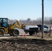 Airmen fill sandbags for flood relief