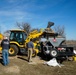 Airmen fill sandbags for flood relief