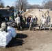 Airmen fill sandbags for flood relief