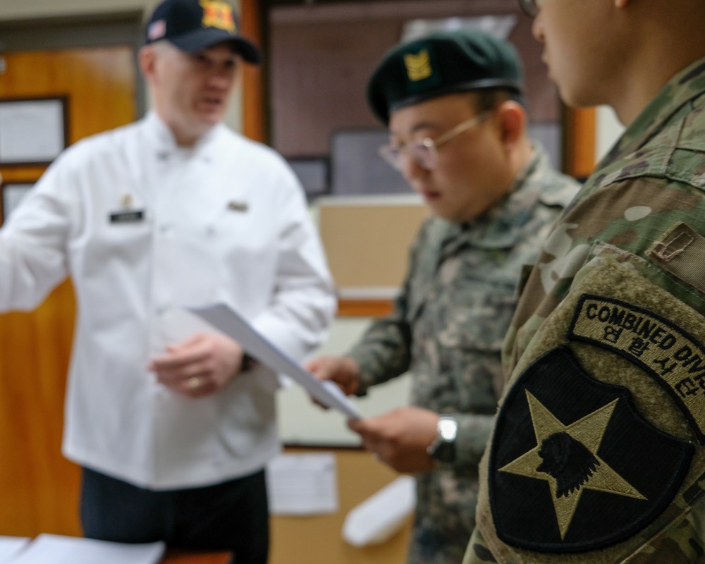 210th FAB DFAC NCOs Share Best Practices with ROK Army VI Corps DFAC Manager