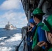 USS Harpers Ferry Conducts A Replenishment At Sea