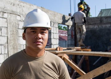 Soldier Returns Home to the Philippines, Helps Build School