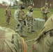 Soldiers from the 101st Brigade Support Battalion learn how to decontaminate themselves after potential chemical attacks.