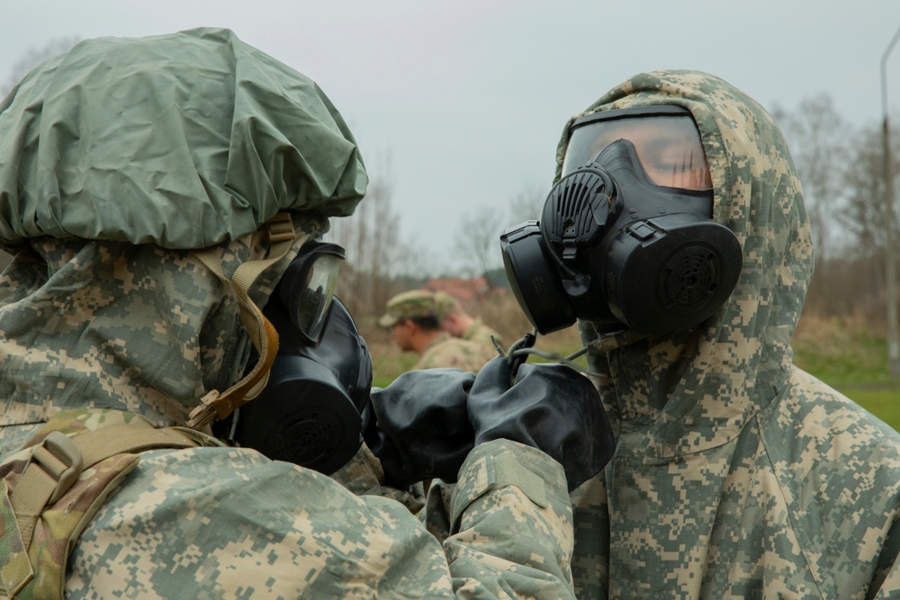 Soldiers from the 101st Brigade Support Battalion learn chemical decontamination.