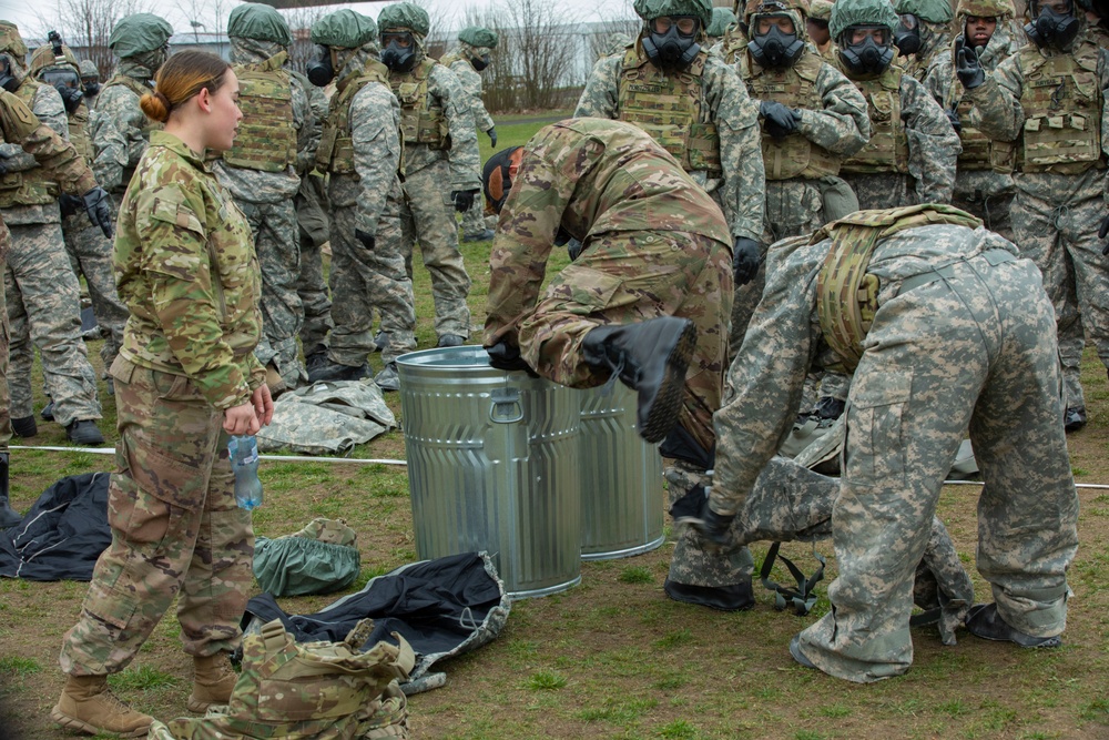 Soldiers from the 101st Brigade Support Battalion learn chemical decontamination.