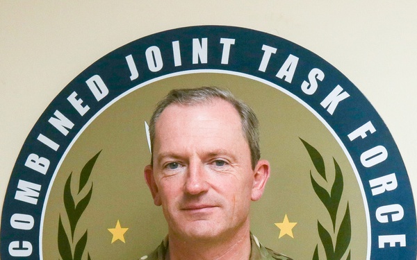 Major General CJ Ghika CBE