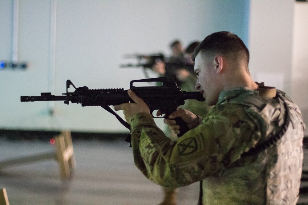 Fort Drum Soldiers training with the Army's Squad Advanced Marksmanship Trainer (SAM-T).