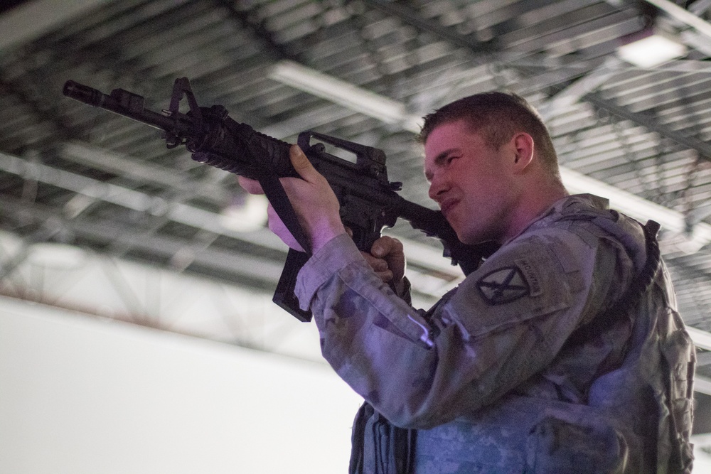 Fort Drum Soldiers training with the Army's Squad Advanced Marksmanship Trainer (SAM-T).