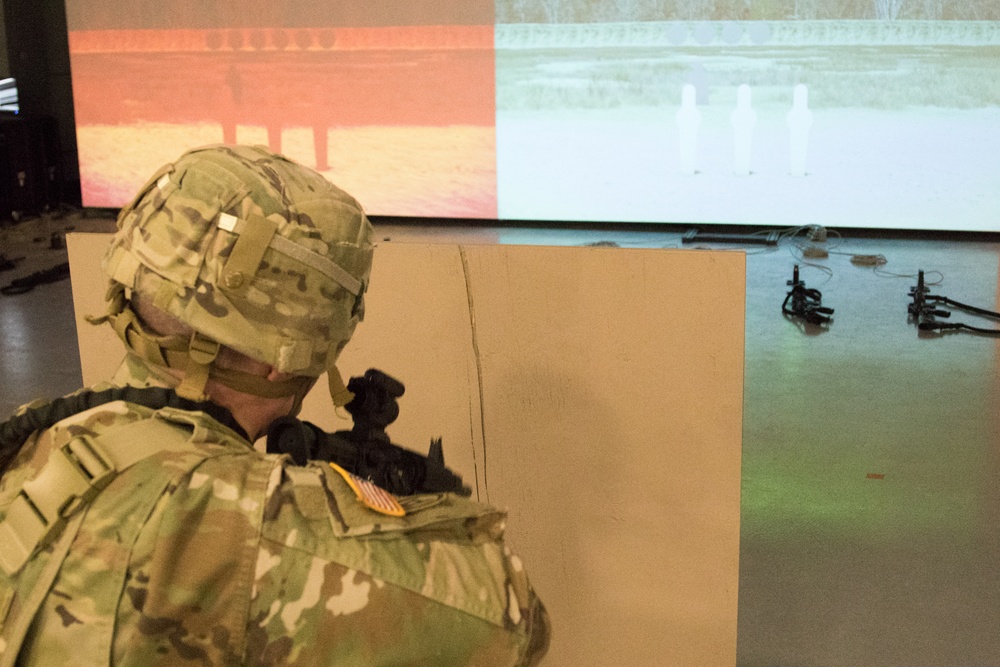 Fort Drum Soldiers training with the Army's Squad Advanced Marksmanship Trainer (SAM-T).