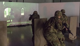 Fort Drum Soldiers training with the Army's Squad Advanced Marksmanship Trainer (SAM-T).