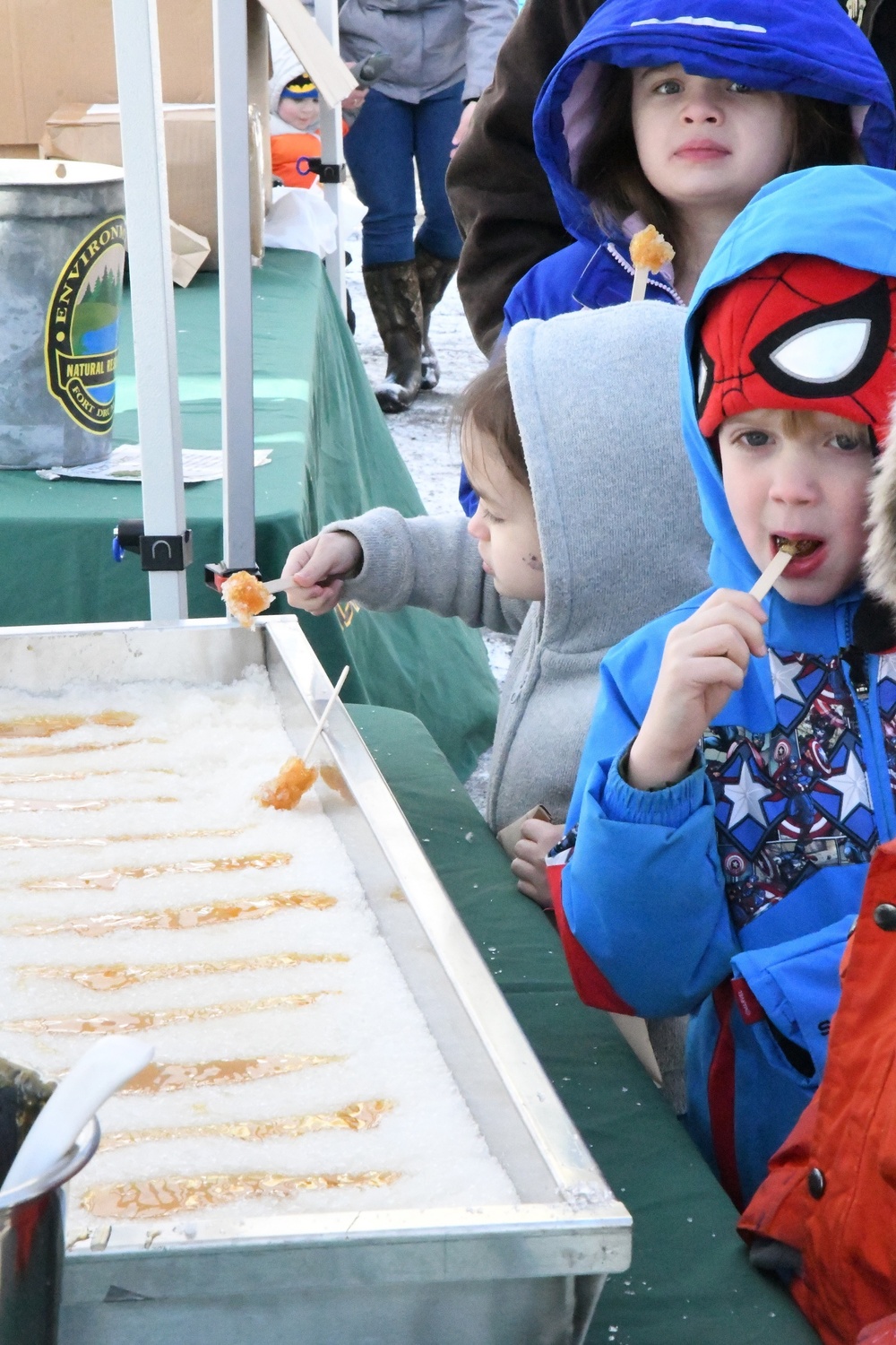 Fort Drum community members discover tree-to-table process of making syrup during Maple Days