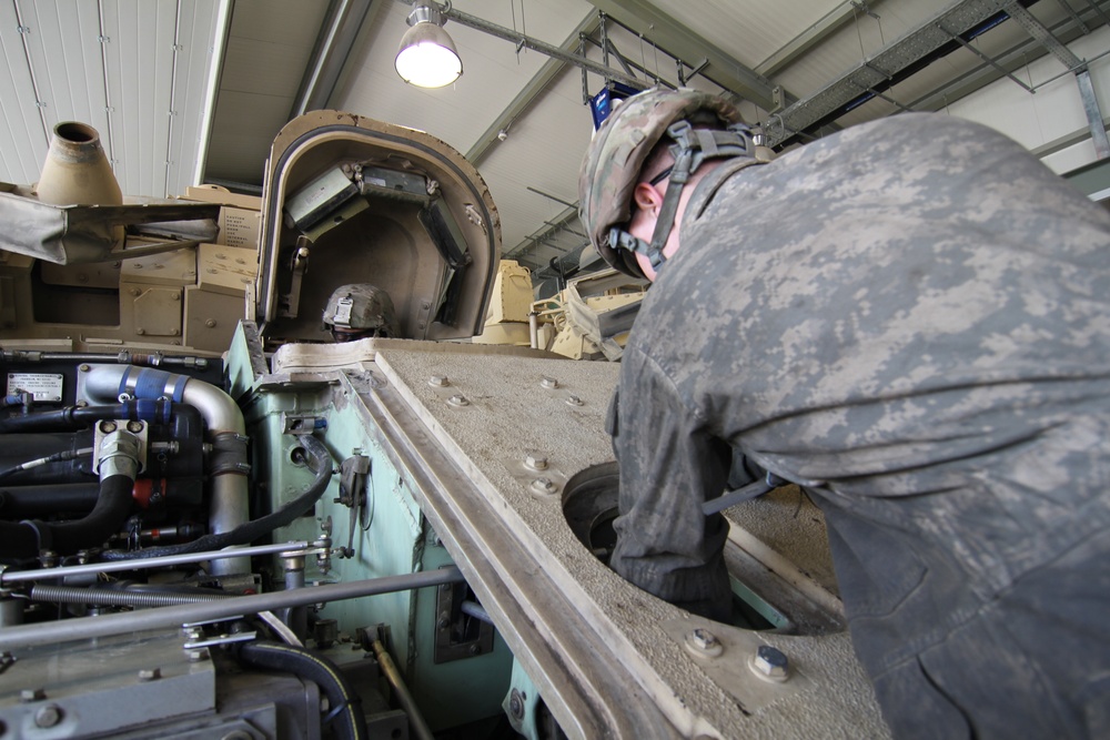 Alpha Company, 1-16th Infantry Regiment performs vehicle services