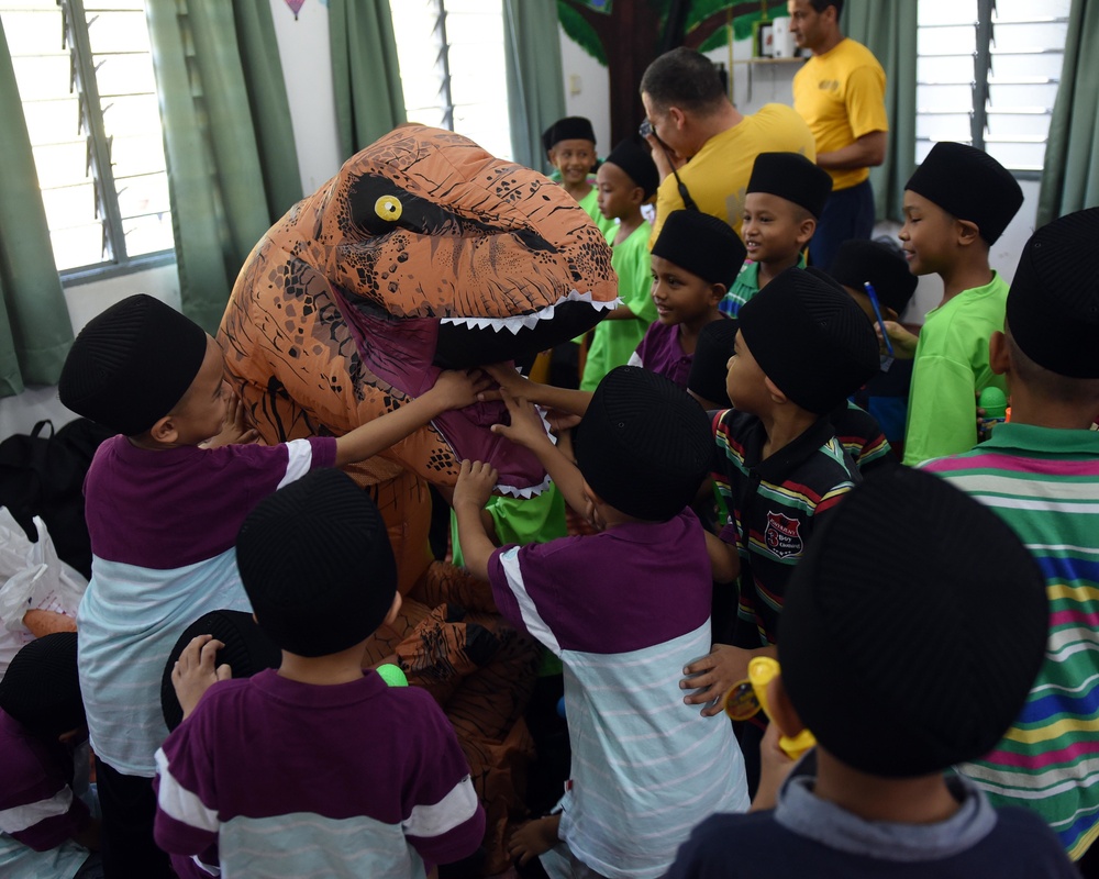 USS Blue Ridge Sailors participate in a community relations event at Rumah Nur Kasih Langkawi Orphanage