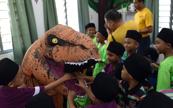 USS Blue Ridge Sailors participate in a community relations event at Rumah Nur Kasih Langkawi Orphanage