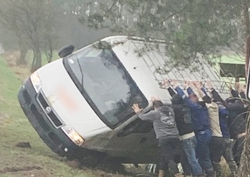 U.S. Airmen aid Polish citizen while deployed for exercise