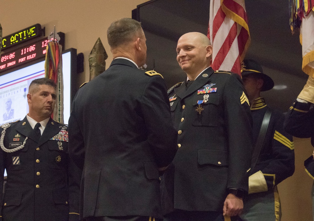 Sgt. Robert K. Debolt recieves the Distinguished Service Cross at Fort Riley.