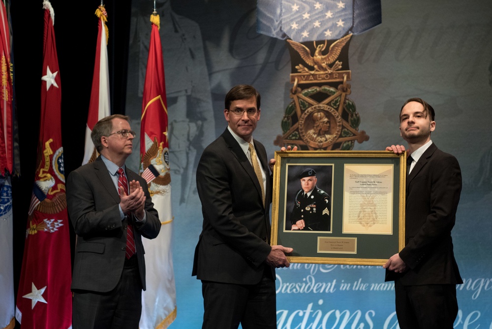 PTDO/DSD posthumously inducts U.S. Army Staff Sgt. Travis Atkins in to the Hall of Heroes