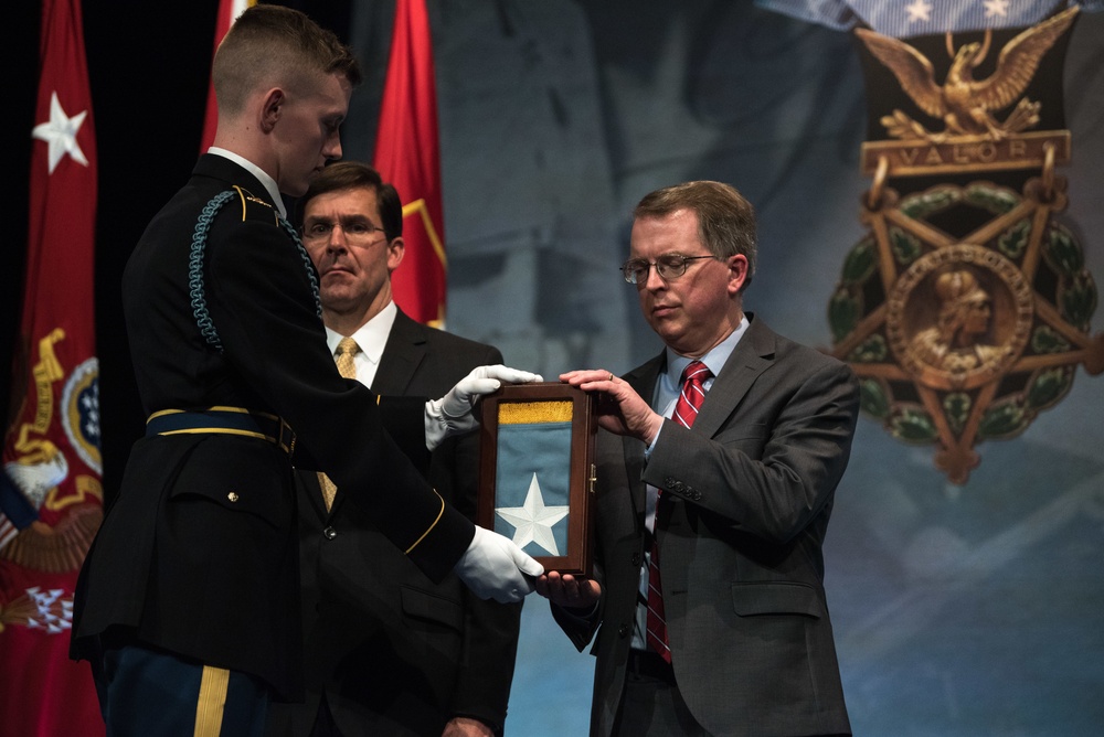 PTDO/DSD posthumously inducts U.S. Army Staff Sgt. Travis Atkins in to the Hall of Heroes