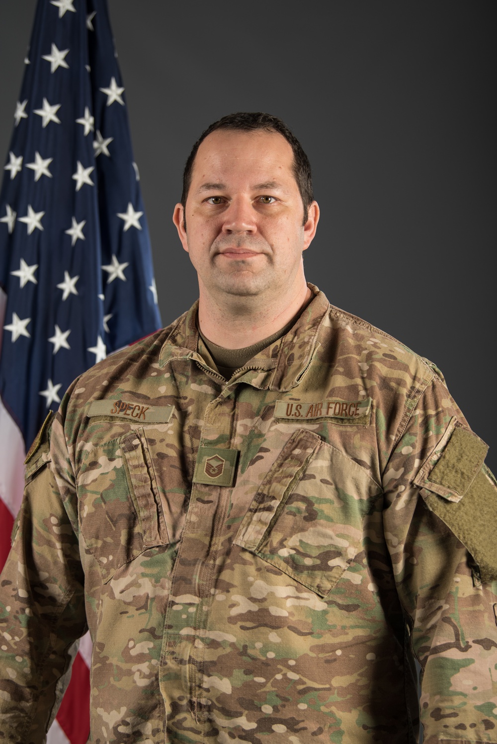 Photojournalist from 123rd Airlift Wing Poses to Demonstrate One-To-One Lighting Ratio