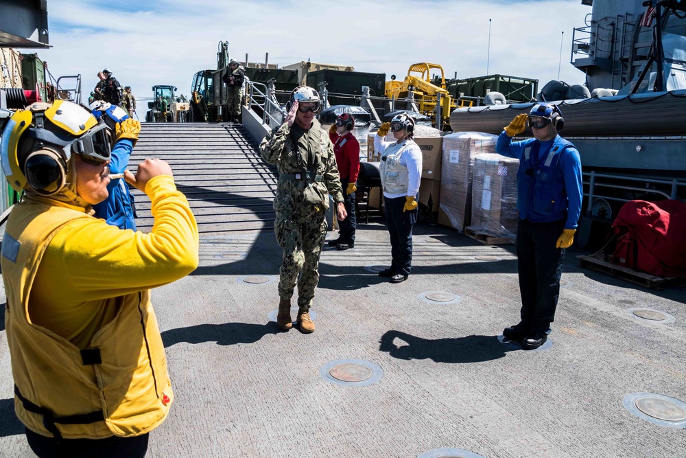 Rear Adm. Bill D. Byrne at sea with USS Harpers Ferry
