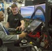 Marines showcase explosive ordnance disposal robots and flight simulator during National Society of Black Engineers conference