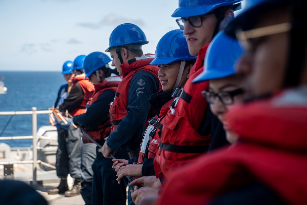 USS Harpers Ferry Conducts A Replenishment at Sea