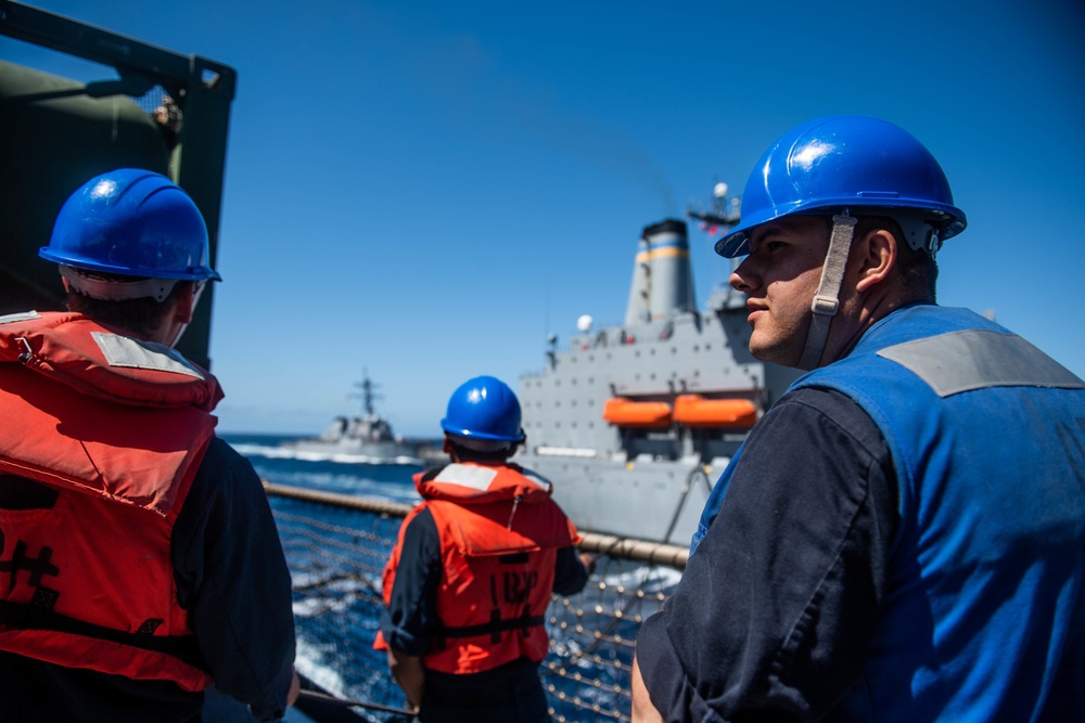 USS Harpers Ferry Conducts A Replenishment at Sea