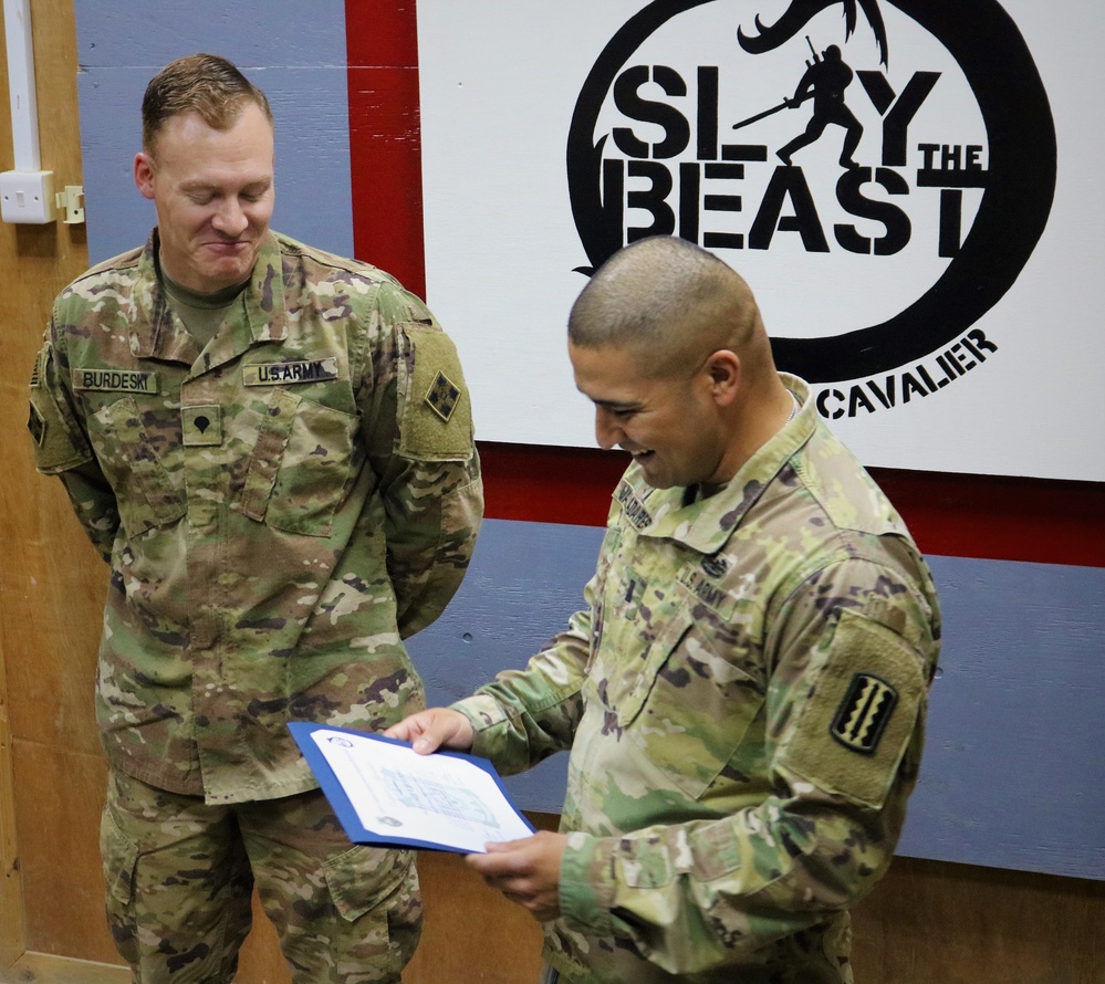 Task Force Cavalier Coin Presentation for Spc. Tiffani Keenan and Spc. Corey Burdeski