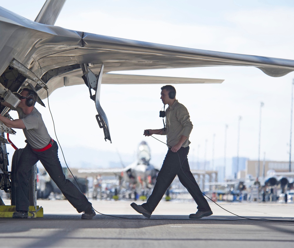 Air Force Reserve maintainers marshal F-22s March 9