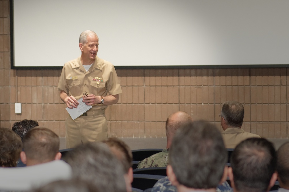 Rear Adm. Paul Pearigen, Commander, Navy Medicine West (NMW), and Chief of the Navy Medical Corps, speaks to the staff.