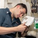 U.S. Sailor replaces a transformer