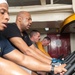 U.S. Sailors particapate in a fitness class