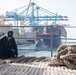 The aircraft carrier USS John C. Stennis (CVN 74) pulls out of Manama, Bahrain