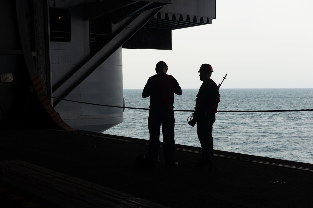 U.S. Sailors prepare for a replenishment-at-sea