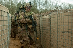 Charlie Company advances to clear trench objective.
