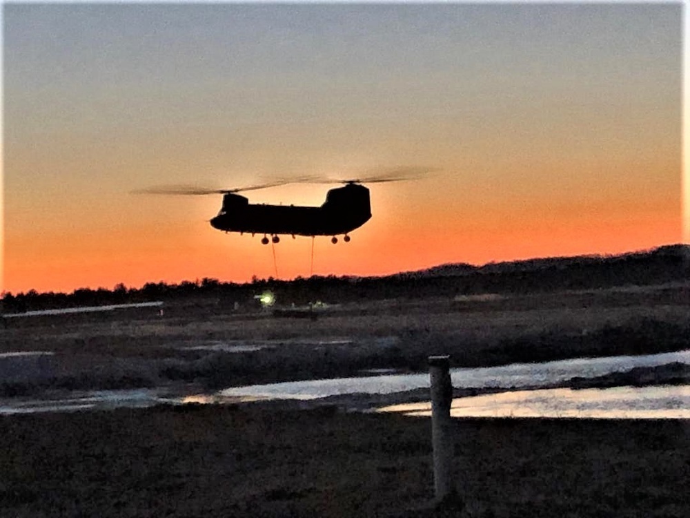 Chinook helicopter, crew, students combined for sling-load training supporting 89B course