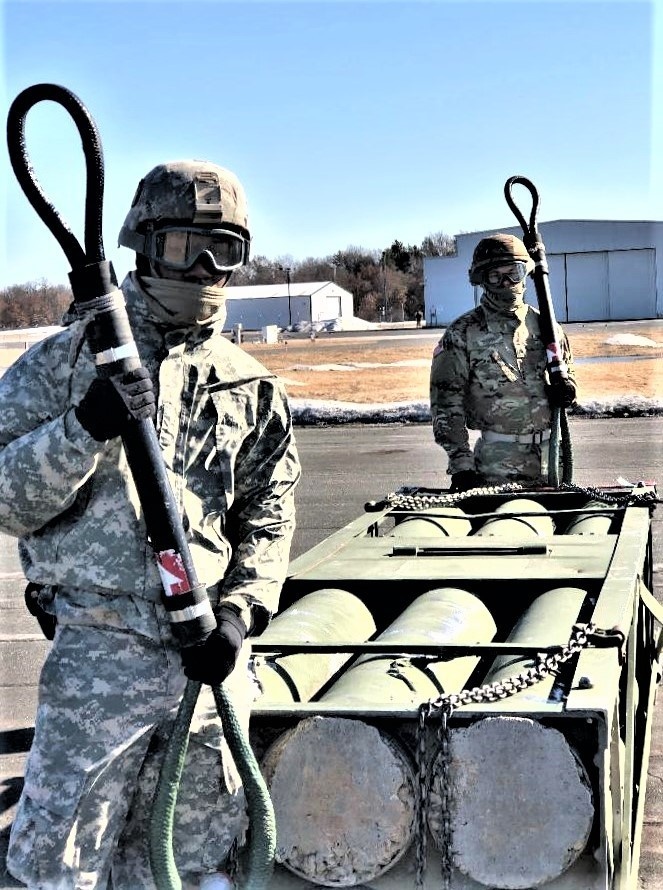 Chinook helicopter, crew, students combined for sling-load training supporting 89B course