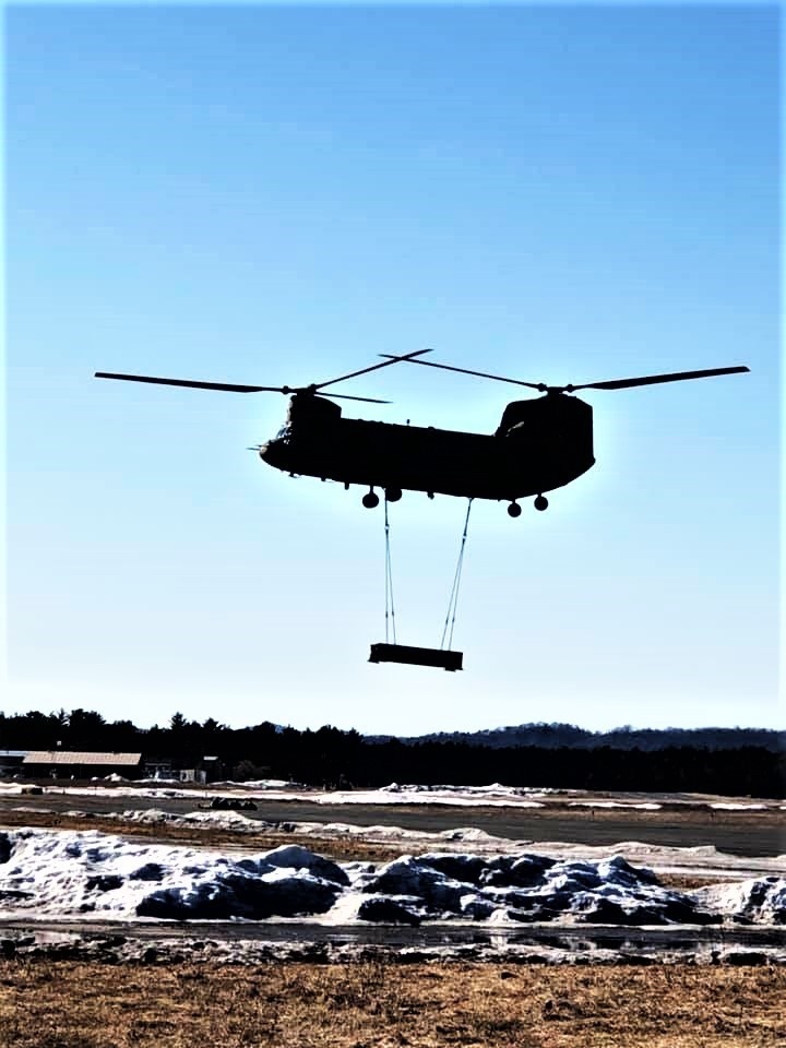 Chinook helicopter, crew, students combined for sling-load training supporting 89B course