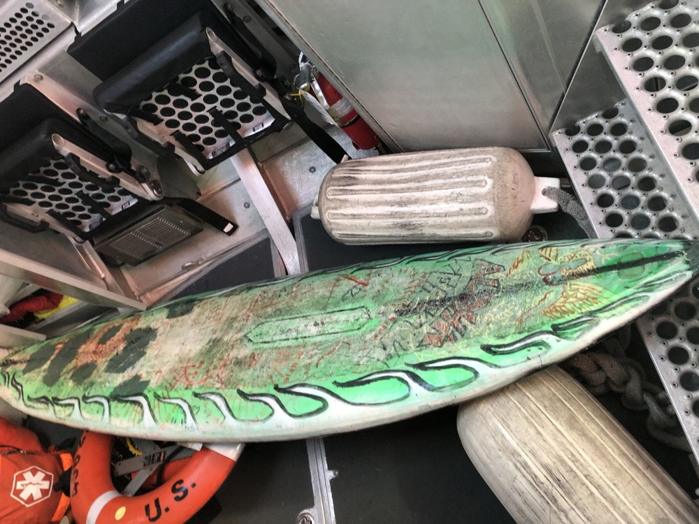 Imagery Available: Coast Guard seeks help to identify owner of adrift surfboard off Honolulu