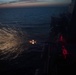 A Mark 38 25mm machine gun system is fired aboard USS Chung-Hoon