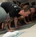 U.S. Sailor particates in an exercise class