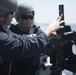 U.S. Navy Sailors participate in a crew served weapons qualification aboard the guided-missile destroyer USS Spruance (DDG 111).