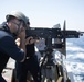 U.S. Navy Sailors participate in a crew served weapons qualification aboard the guided-missile destroyer USS Spruance (DDG 111).