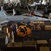 U.S. Sailors transport cargo in the hangar bay