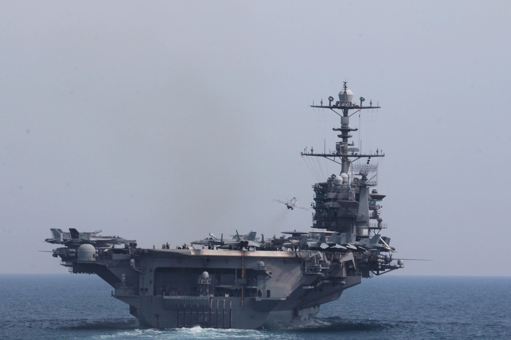 An aircraft launches from the aircraft carrier USS John C. Stennis (CVN 74)