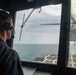 MH-60S Sea Hawk helicopter launches from USS Stockdale