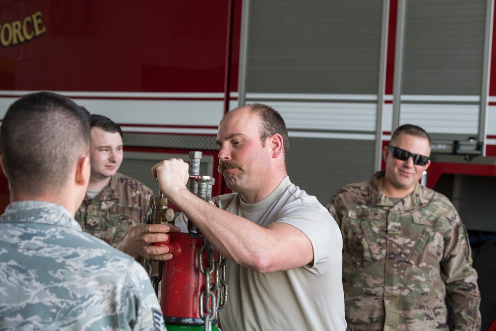 101st and 103rd Firefighters Team Up For Training at Savannah Air National Guard