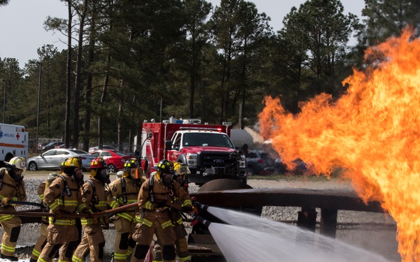 101st and 103rd Firefighters Team Up For Training at Savannah Air National Guard