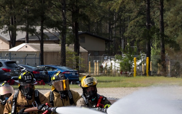 101st and 103rd Firefighters Team Up For Training at Savannah Air National Guard